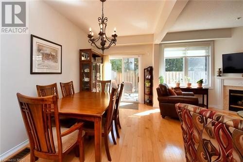 81 Valridge Drive Unit# 36, Ancaster, ON - Indoor Photo Showing Dining Room With Fireplace