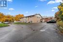 rear view/parking for 5 cars - 256 South Drive, Simcoe, ON  - Outdoor 