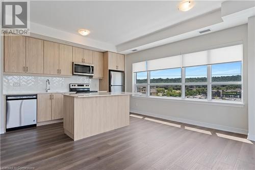 Large Island - 121 #8 Highway Unit# 516, Stoney Creek, ON - Indoor Photo Showing Kitchen