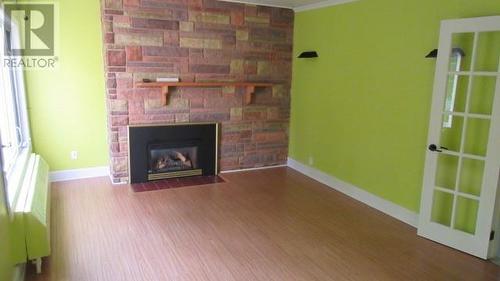 53 Elswick Road, Corner Brook, NL - Indoor Photo Showing Living Room With Fireplace