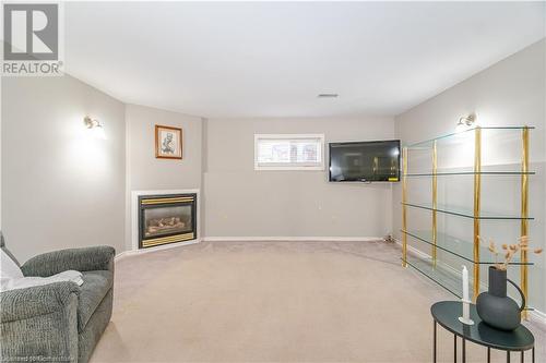 63 Hillgarden Drive, Stoney Creek, ON - Indoor Photo Showing Living Room With Fireplace