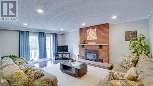 66 Glen Cannon Drive, Stoney Creek, ON - Indoor Photo Showing Living Room With Fireplace