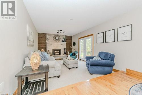 5776 Wellington Rd 26, Rockwood, ON - Indoor Photo Showing Living Room With Fireplace