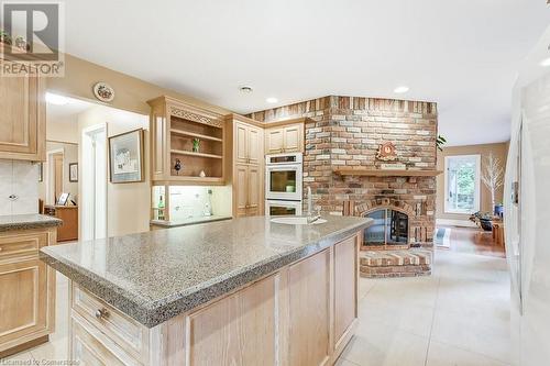 5146 Township Road 1, Guelph/Eramosa, ON - Indoor Photo Showing Kitchen With Fireplace