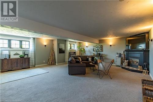 11635 Burnaby Road, Wainfleet, ON - Indoor Photo Showing Other Room With Fireplace