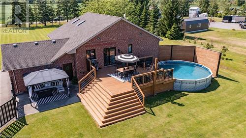 11635 Burnaby Road, Wainfleet, ON - Outdoor With Above Ground Pool With Deck Patio Veranda With Exterior