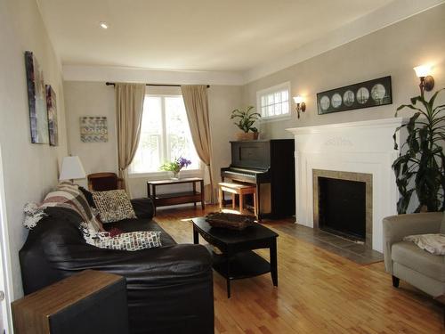 6060 Hwy 11/71, Emo, ON - Indoor Photo Showing Living Room With Fireplace