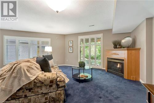 2120 Headon Road Unit# 23, Burlington, ON - Indoor Photo Showing Living Room With Fireplace