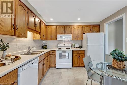 8 Village Green Unit# 611, Stoney Creek, ON - Indoor Photo Showing Kitchen With Double Sink