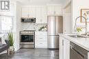 136 East 35Th Street, Hamilton, ON  - Indoor Photo Showing Kitchen With Double Sink With Upgraded Kitchen 