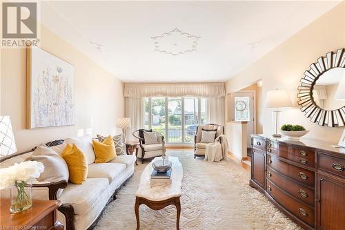 Bright living room with large window - 185 Nugent Drive, Hamilton, ON - Indoor Photo Showing Living Room