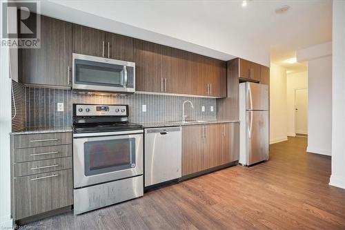 55 Speers Road Unit# 212, Oakville, ON - Indoor Photo Showing Kitchen