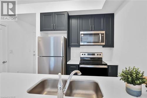 470 Dundas Street E Unit# 801, Waterdown, ON - Indoor Photo Showing Kitchen With Double Sink With Upgraded Kitchen