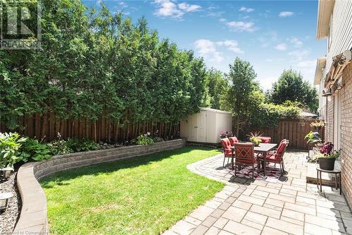 private backyard with large storage shed - 54 Stonepine Crescent, Hamilton, ON - Outdoor With Deck Patio Veranda