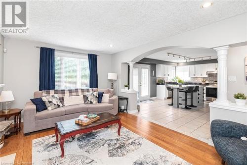 family room open to kitchen - 54 Stonepine Crescent, Hamilton, ON - Indoor Photo Showing Living Room