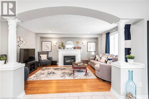 bright and roomy - 54 Stonepine Crescent, Hamilton, ON - Indoor Photo Showing Living Room With Fireplace