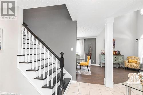 professionally refinished staircase - 54 Stonepine Crescent, Hamilton, ON - Indoor Photo Showing Other Room