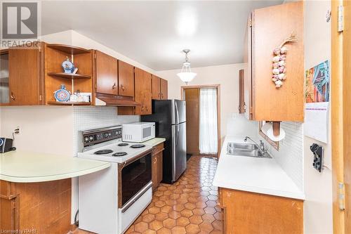 14 Calvert Avenue, Hamilton, ON - Indoor Photo Showing Kitchen With Double Sink