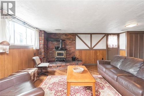 14 Calvert Avenue, Hamilton, ON - Indoor Photo Showing Living Room With Fireplace