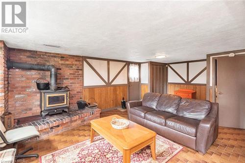 14 Calvert Avenue, Hamilton, ON - Indoor Photo Showing Living Room With Fireplace