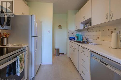 222 Jackson Street W Unit# 206, Hamilton, ON - Indoor Photo Showing Kitchen With Double Sink