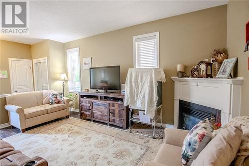 20 Springstead Avenue, Hamilton, ON - Indoor Photo Showing Living Room With Fireplace