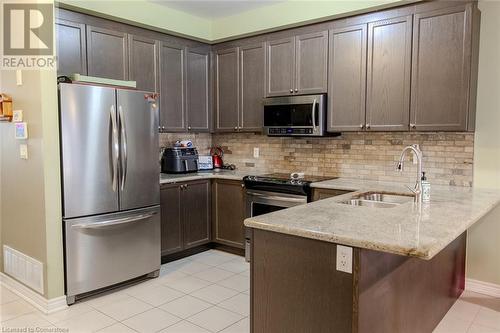 20 Springstead Avenue, Hamilton, ON - Indoor Photo Showing Kitchen With Stainless Steel Kitchen With Double Sink With Upgraded Kitchen