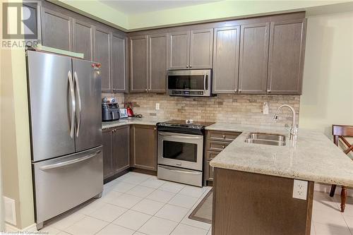 20 Springstead Avenue, Hamilton, ON - Indoor Photo Showing Kitchen With Stainless Steel Kitchen With Double Sink With Upgraded Kitchen