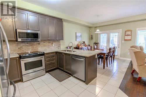 20 Springstead Avenue, Hamilton, ON - Indoor Photo Showing Kitchen With Stainless Steel Kitchen With Double Sink With Upgraded Kitchen