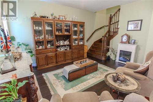 20 Springstead Avenue, Hamilton, ON - Indoor Photo Showing Living Room With Fireplace