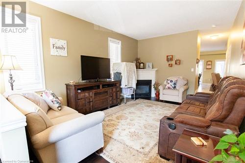 20 Springstead Avenue, Hamilton, ON - Indoor Photo Showing Living Room With Fireplace