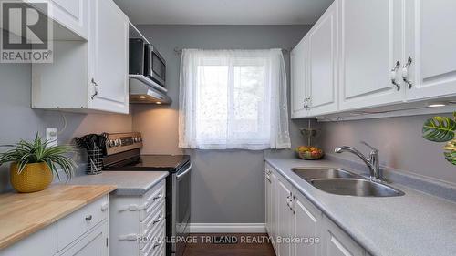 56 - 166 Southdale Road W, London, ON - Indoor Photo Showing Kitchen With Double Sink