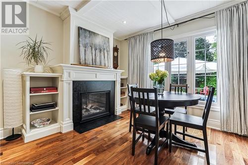 Dining area with fireplace - 607 Locust Street, Burlington, ON - Indoor Photo Showing Dining Room With Fireplace