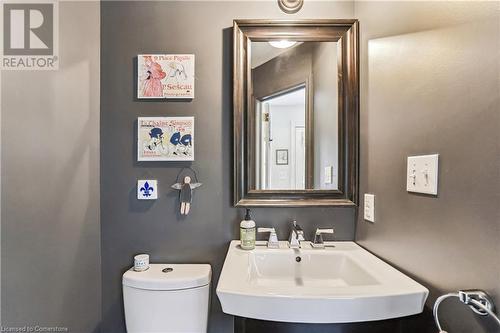 Powder room for guests - 607 Locust Street, Burlington, ON - Indoor Photo Showing Bathroom