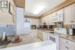 Galley kitchen, view from dining room - 