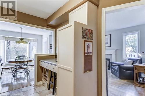 kitchen has working desk area - 2141 Ghent Avenue, Burlington, ON - Indoor With Fireplace