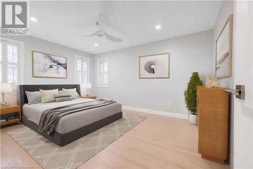 Primary bedroom - virtually staged - 313 Silvana Crescent, Burlington, ON - Indoor Photo Showing Bedroom