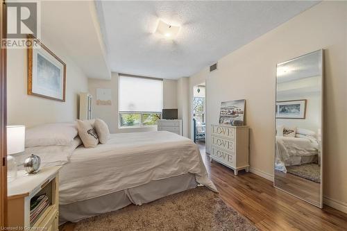 Light-filled - 1270 Maple Crossing Boulevard Unit# 204, Burlington, ON - Indoor Photo Showing Bedroom