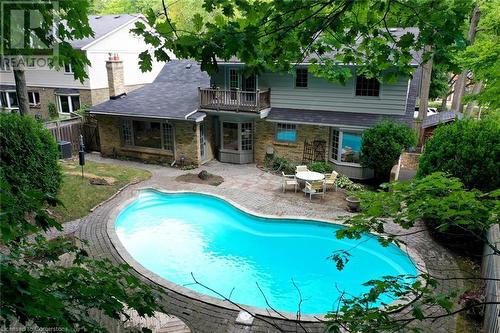 1928 Four Seasons Drive, Burlington, ON - Outdoor With In Ground Pool With Deck Patio Veranda