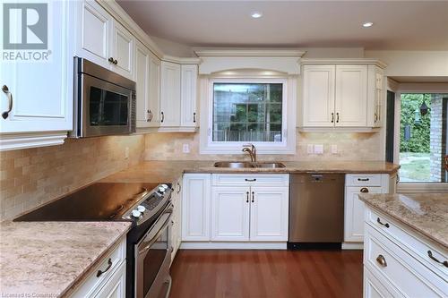 1928 Four Seasons Drive, Burlington, ON - Indoor Photo Showing Kitchen With Double Sink