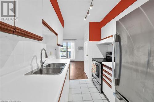 Galley kitchen - 482 James Street N Unit# 203, Hamilton, ON - Indoor Photo Showing Kitchen With Double Sink