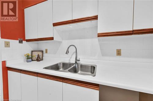 Double sink with shut offs - 482 James Street N Unit# 203, Hamilton, ON - Indoor Photo Showing Kitchen With Double Sink