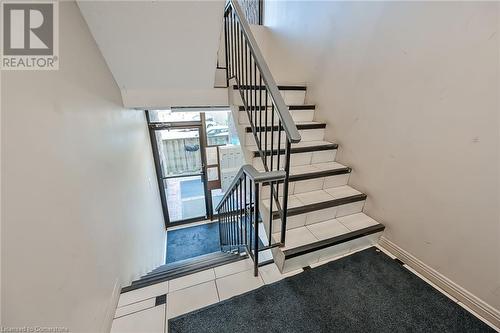 Short flight to main entrance - 482 James Street N Unit# 203, Hamilton, ON - Indoor Photo Showing Other Room