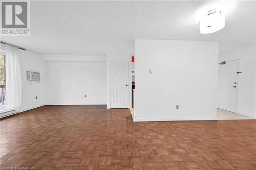 Parquet floors - 482 James Street N Unit# 203, Hamilton, ON - Indoor Photo Showing Other Room