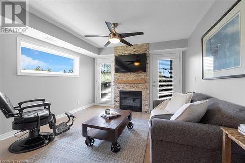 10 Brandy Lane Unit# 201, Collingwood, ON - Indoor Photo Showing Living Room With Fireplace