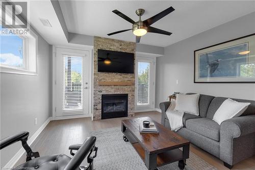 10 Brandy Lane Unit# 201, Collingwood, ON - Indoor Photo Showing Living Room With Fireplace