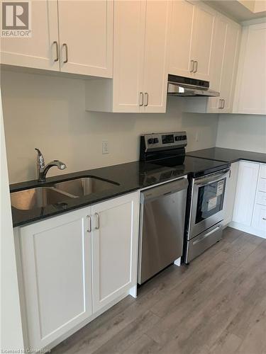 200 Lagerfeld Drive Unit# 1108, Brampton, ON - Indoor Photo Showing Kitchen With Stainless Steel Kitchen With Double Sink