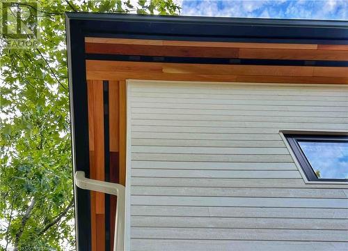 Clear cedar soffit detail. Custom Maibec wood siding. - 5427 Anthony Place, Burlington, ON - Outdoor With Exterior