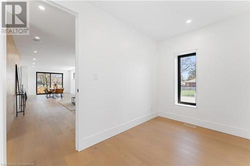 View from corner office to living area. Door for privacy. - 5427 Anthony Place, Burlington, ON - Indoor Photo Showing Other Room