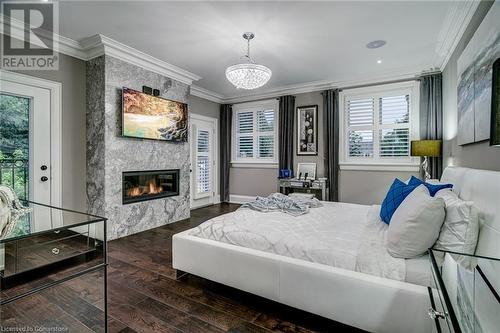 87 Parker Avenue, Ancaster, ON - Indoor Photo Showing Bedroom With Fireplace